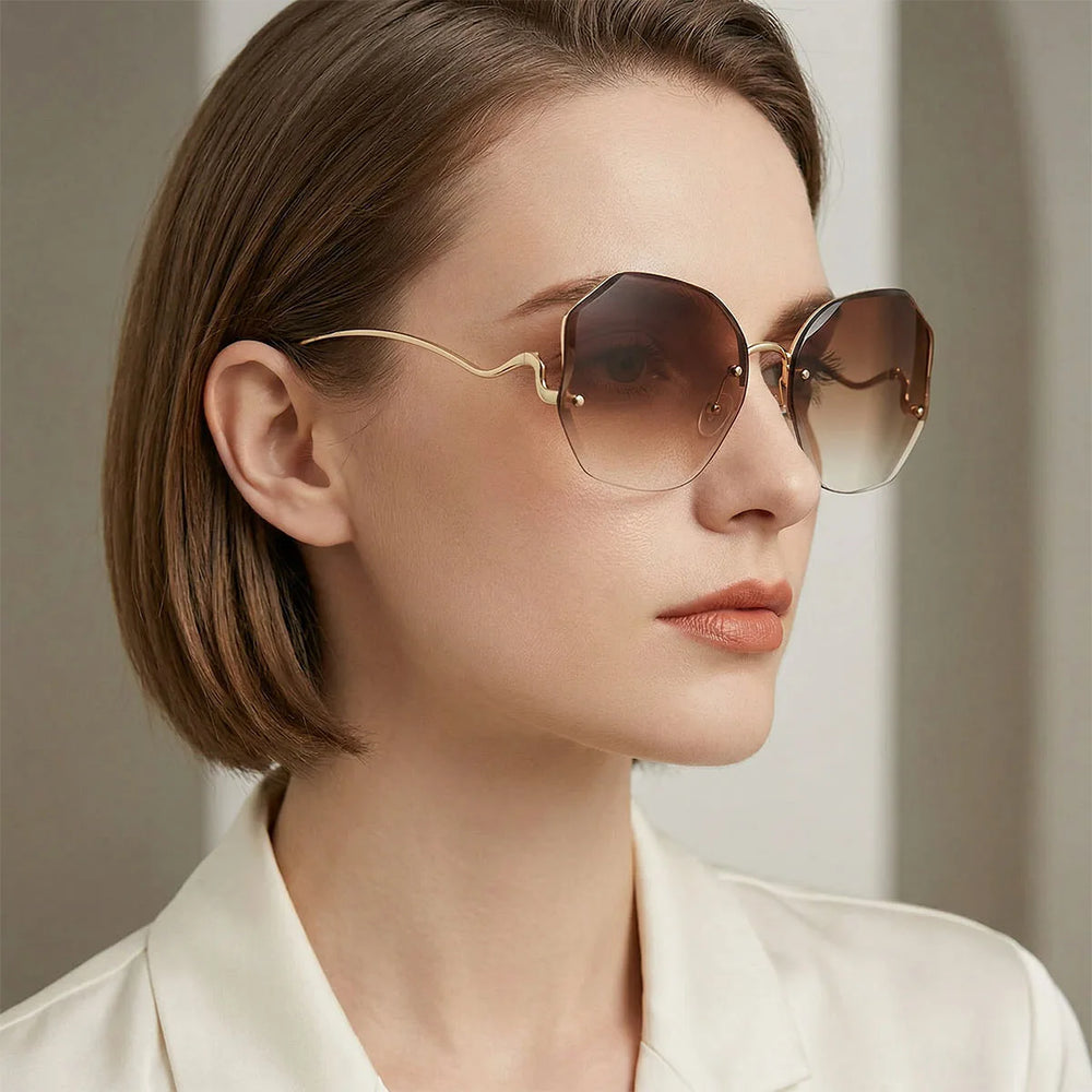 Lyra Rimless Oval Sunglasses