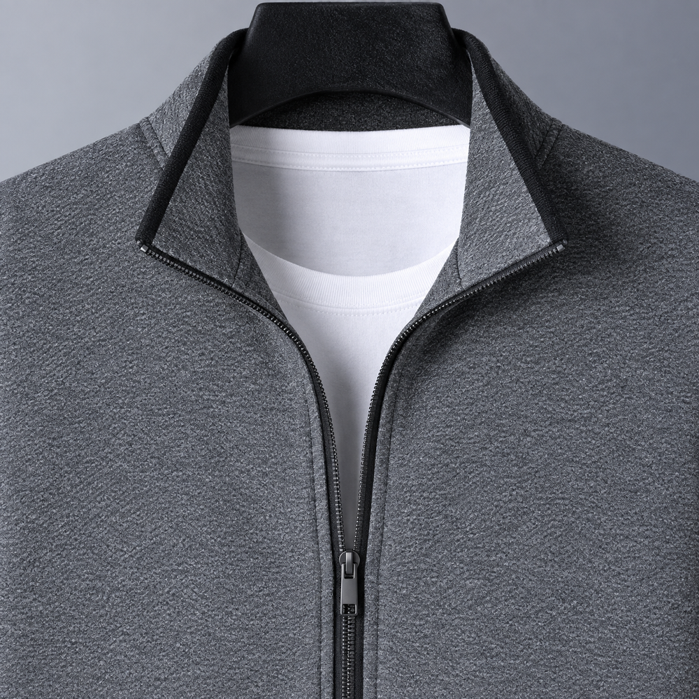 Close view of gray Monza track jacket collar and front zipper